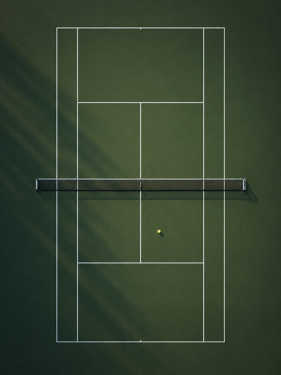 Player stretching for a forehand on clay